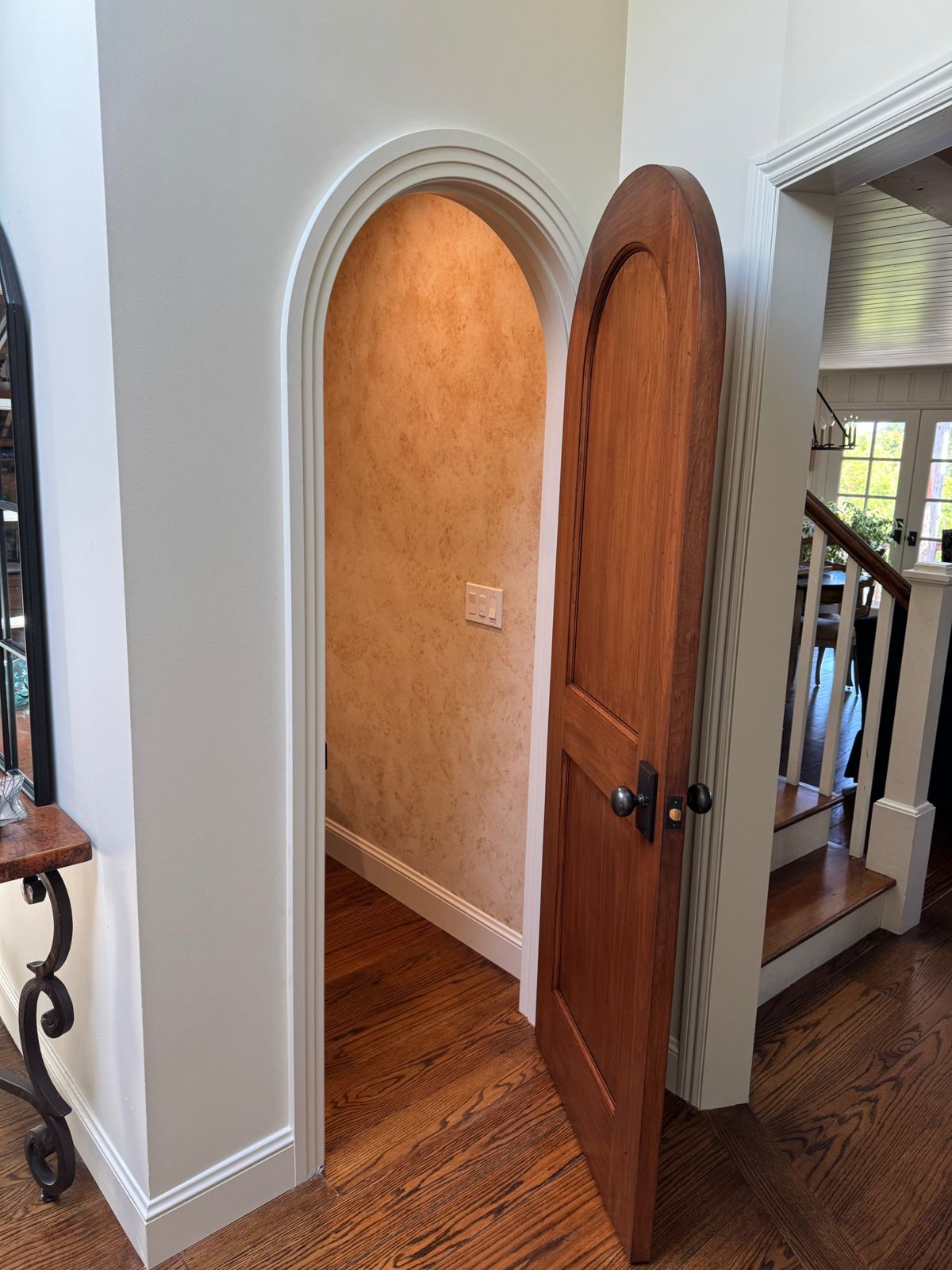 Arched doorway with a decorative wall finish